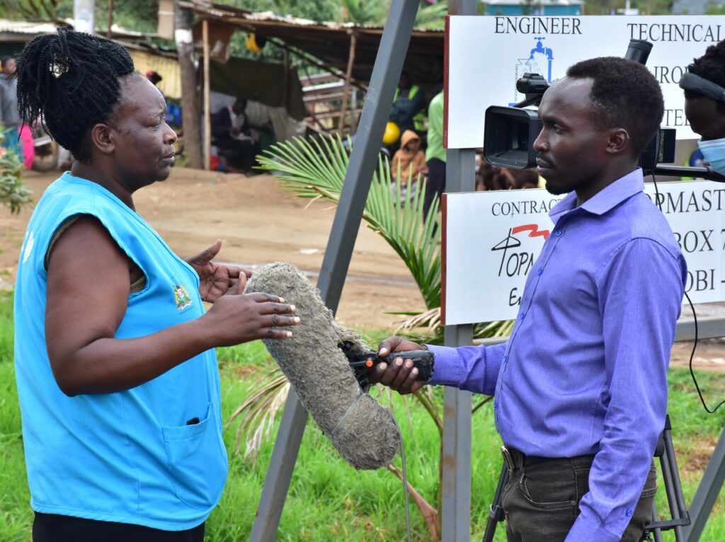 Cheptiony Interviewing a subject for an advocacy documentary in Kenya